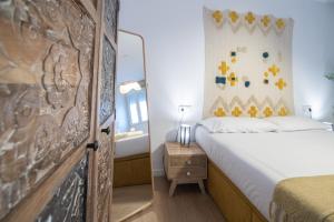 Postel nebo postele na pokoji v ubytování Apartamento La Habanera de Cadiz