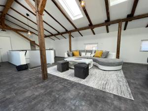 Posezení v ubytování GLEIS 13 - THE LOFT im ehemaligen Lokschuppen