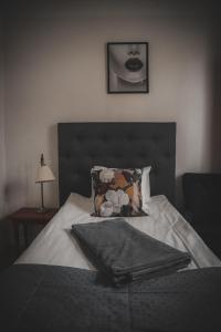 Voodi või voodid majutusasutuse Mojo Hotell toas