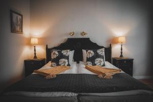 Voodi või voodid majutusasutuse Mojo Hotell toas