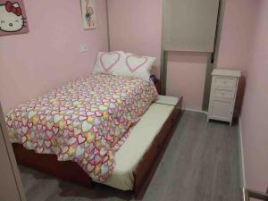 Łóżko lub łóżka w pokoju w obiekcie Duplex acogedor y cómodo