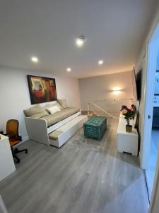 Un pat sau paturi într-o cameră la Duplex acogedor y cómodo
