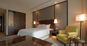 Postel nebo postele na pokoji v ubytování Eastin Hotel Kuala Lumpur