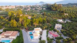 an aerial view of a residential neighborhood with houses at Grande Mandi & Jani Villa in Laganas