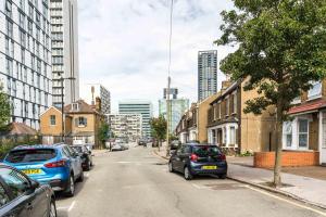 a city street with cars parked on the side of the road at Edridge Lodge Photo ID Required in Croydon