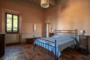 a bedroom with a bed in the corner of a room at Villa Lama by Mmega in Lama +23 photos