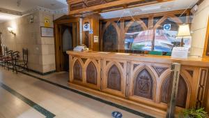 a restaurant with a wooden bar in a building at Hotel Santo Domingo de Silos in Santo Domingo de Silos +74 photos
