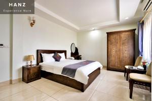 Кровать или кровати в номере HANZ Duc Hieu 1 Hotel