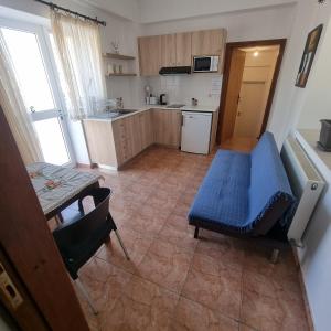 Kuchyň nebo kuchyňský kout v ubytování Potamos Private Suites