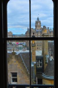 a view of a city from a window at The Inn Place in Edinburgh