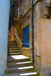 a set of stairs leading up to a building at The Inn Place in Edinburgh +24 photos