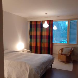 2 room apartment in Tapiolaにあるベッド