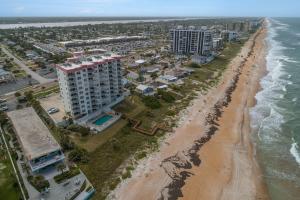 an aerial view of a beach and buildings at Sea Winds 501 - Corner Breeze in Ormond Beach