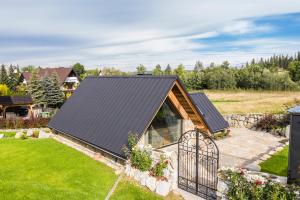 Vonkajšia záhrada v ubytovaní TatryTop Domek Pogoda Premium