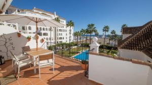 Swimmingpoolen hos eller tæt på Marina Real 414