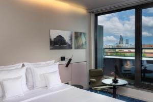 Postel nebo postele na pokoji v ubytování SANA Berlin Hotel + 37 fotografií