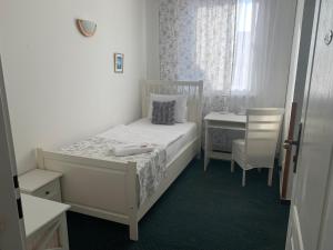 Postel nebo postele na pokoji v ubytování White House
