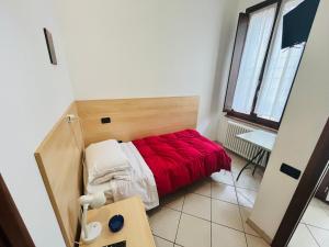 Posteľ alebo postele v izbe v ubytovaní Al Cacciatore