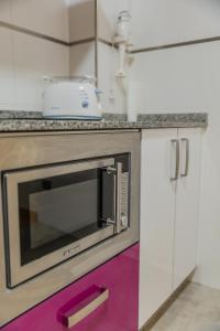 A kitchen or kitchenette at Apartamentos & casas rurales Santo Domingo de Silos