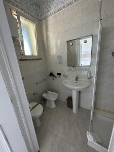 Koupelna v ubytování Porto Cesareo Hotel