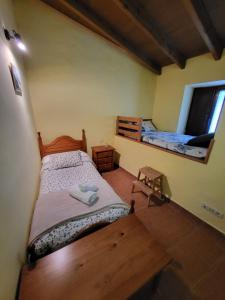 Postel nebo postele na pokoji v ubytování Casa Rural La Severina