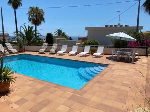 Bazén v ubytovaní Nuza, Villa con Piscina y Barbacoa alebo v jeho blízkosti