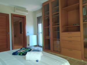 Posteľ alebo postele v izbe v ubytovaní Nuza, Villa con Piscina y Barbacoa