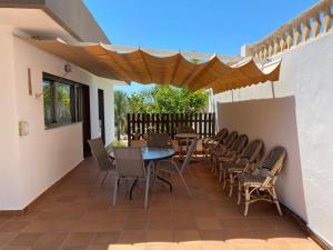 Balkón alebo terasa v ubytovaní Nuza, Villa con Piscina y Barbacoa