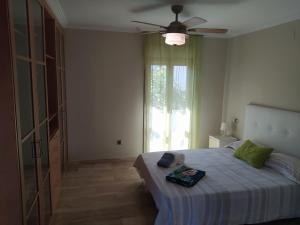 Posteľ alebo postele v izbe v ubytovaní Nuza, Villa con Piscina y Barbacoa