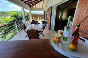 Balkón nebo terasa v ubytování 972D1 - Résidences Tamarin Haut de villa Tamarin 200m2 vue panoramique