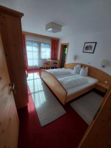 Postel nebo postele na pokoji v ubytování Haus Theresia