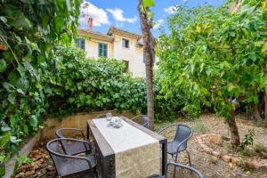 Vonkajšia záhrada v ubytovaní Apartment Sinjorina Leticia