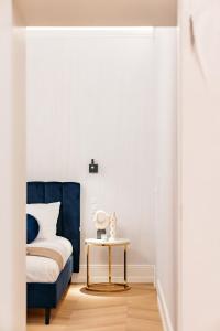Łóżko lub łóżka w pokoju w obiekcie Dandelion Apartment - LoftAffair
