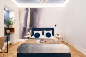 Łóżko lub łóżka w pokoju w obiekcie Dandelion Apartment - LoftAffair