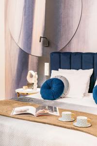 Łóżko lub łóżka w pokoju w obiekcie Dandelion Apartment - LoftAffair