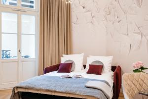 Łóżko lub łóżka w pokoju w obiekcie Dandelion Apartment - LoftAffair