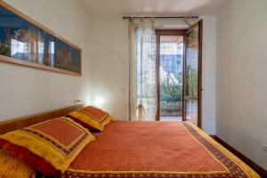 Posteľ alebo postele v izbe v ubytovaní La casa di Sarah