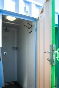 a door leading into a room with a hallway at Kite Basecamp Langebaan in Langebaan