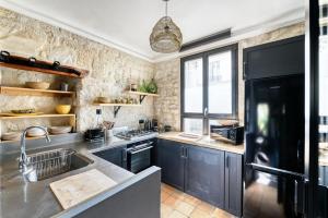 Zdjęcie z galerii obiektu Maison 60m² avec jardin de 90m² au centre de Paris w Paryżu