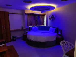 Posteľ alebo postele v izbe v ubytovaní Hotel Lotus
