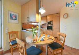 Kuchyň nebo kuchyňský kout v ubytování Maisonette-Wohnungen am Steingarten - Ferienwohnung 2