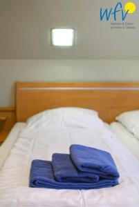 Postel nebo postele na pokoji v ubytování Maisonette-Wohnungen am Steingarten - Ferienwohnung 2
