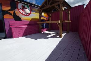 a building with a mural on the side of it at Penthouse Apartment, Sleeps 21 with terrace in Liverpool