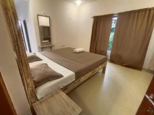 SHANKAR by the SEA, 2 min from Mandrem Beach客房内的一张或多张床位