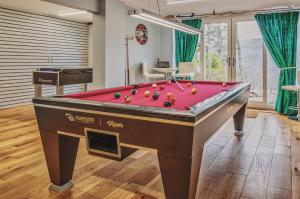 a billiard room with a pool table at Loch Ness Mansion in Invermoriston