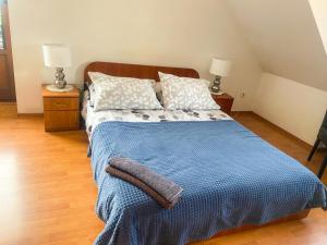 Llit o llits en una habitació de Pokoje Gościnne Emilio