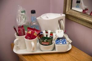 a coffee maker on a tray on a table at The Grove in St. Davids