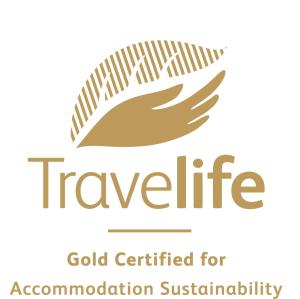 um logótipo para o objetivo certificado para a sustentabilidade da associação em Aelius Hotel and Spa em Gouves