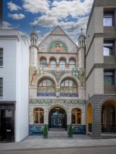 a building with a mural on the front of it at Clayton Hotel Bristol City in Bristol