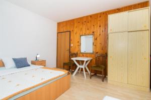 Postel nebo postele na pokoji v ubytování Apartment Mijo